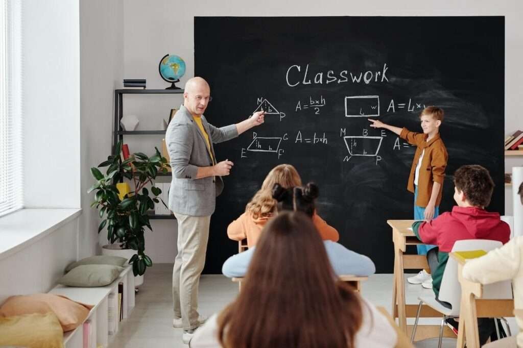 Teaching class room school kids children black bord